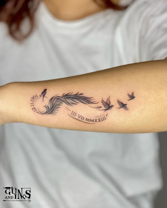 Small Fine Line Feather and Birds Tattoo on Women Arm by @gunsandinkstattoos