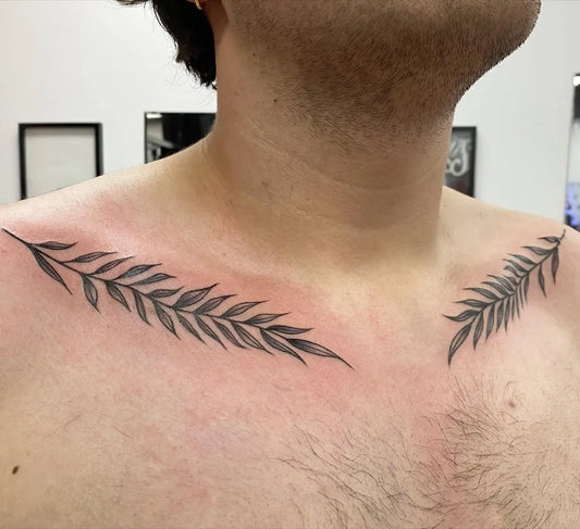 Small Fine Line Fern Leaves Tattoo on Men Collarbone by @jennyyyyflores