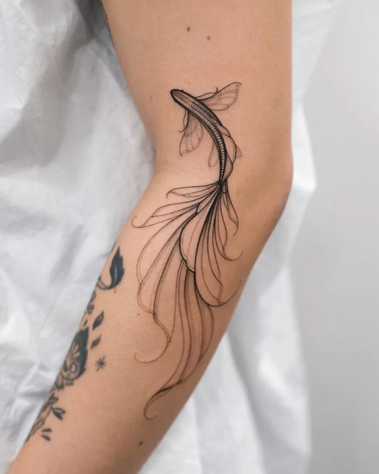 Small Fine Line Fish Tattoo on Women Arm by @nastyafox
