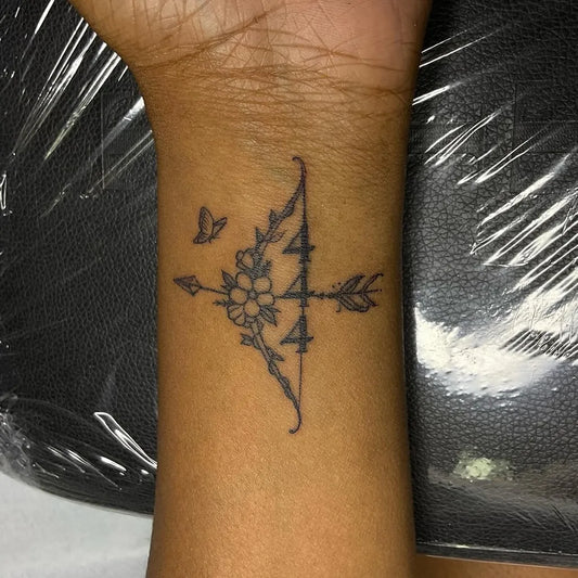 Small Fine Line Floral Arrow 444 on Women Wrist Tattoo by @carlitto.wrld_tattoos