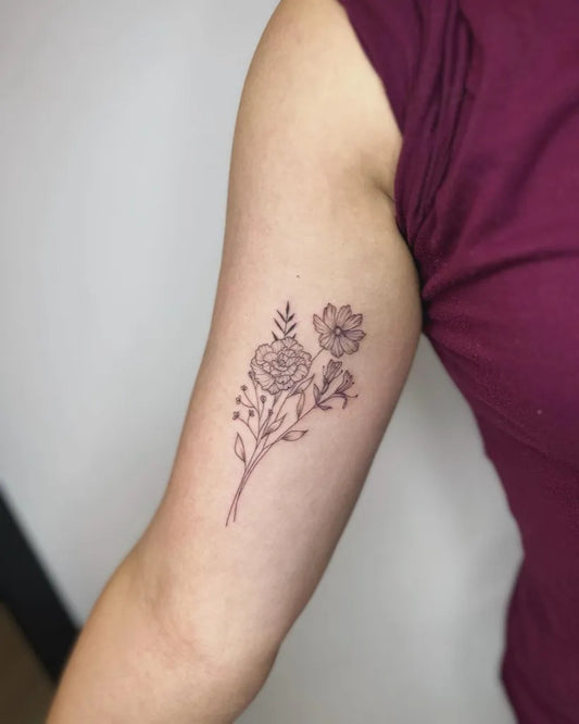 Small Fine Line Floral Bouquet Tattoo on Women Inner Arm by @cococreativetattoo