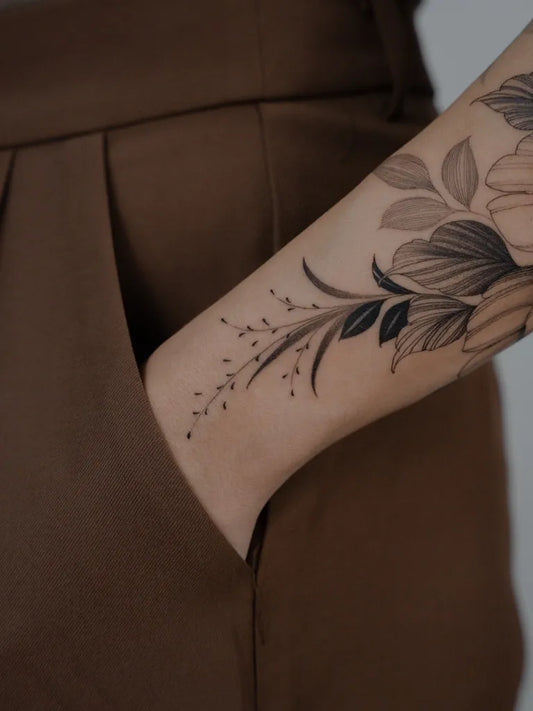 Small Fine Line Floral Branch on Women Arm Tattoo by @alanhartt