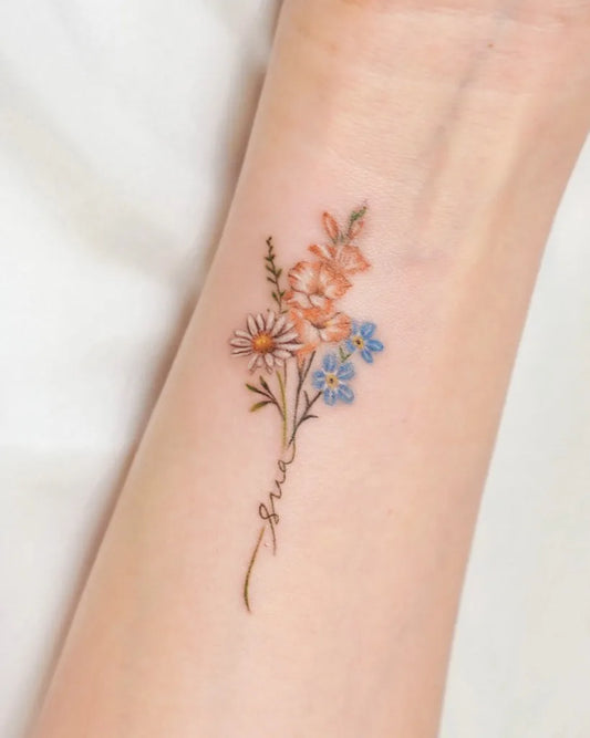 Small Fine Line Flower Bunch Daisy Tattoo on Women Wrist by @yous_tattoo