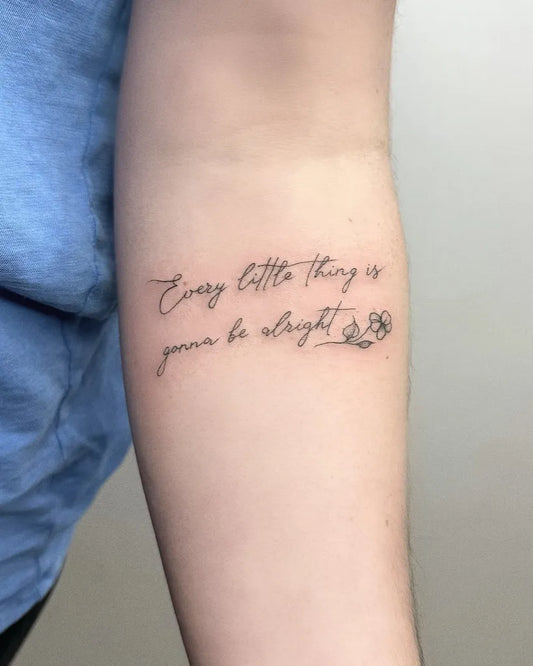 Small Fine Line Flower Quote Tattoo on Women Arm by @nellys_artistry_tattoo_pmu