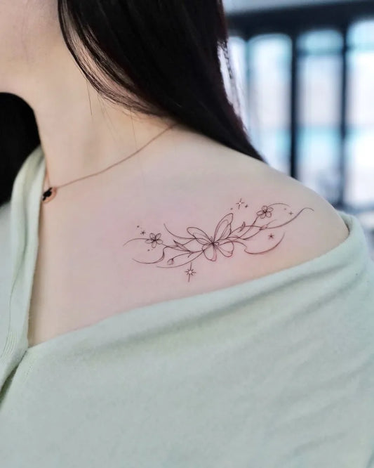 Small Fine Line Flowers Butterfly on Women Shoulder Tattoo by @yeowool_tattooer