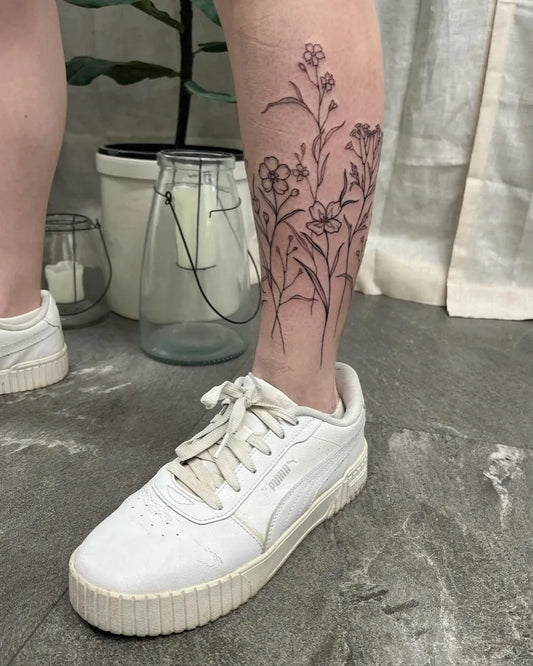Small Fine Line Flowers Tattoo on Women Ankle by @gracedoestattoos