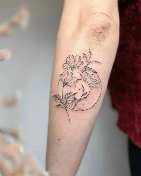 Small Fine Line Flowers Vinyl Music Tattoo on Women Arm by @nothingwildtattoo