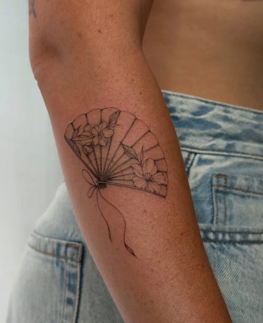 Small Fine Line Folding Fan with Flowers on Women Arm Tattoo by @chloelanetattoos