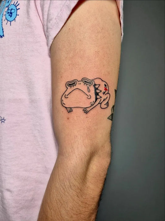 Small Fine Line Frog Tattoo on Men Arm by @matibbink