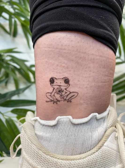 Small Fine Line Frog Tattoo on Women Ankle by @phoebetattoos