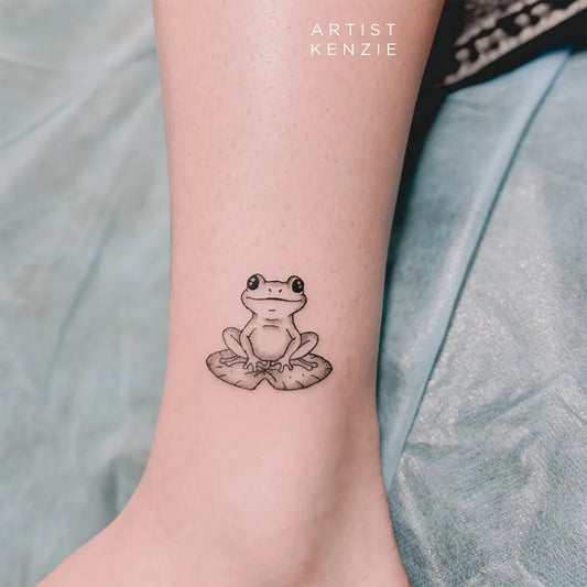 Small Fine Line Frog on Lily Pad Tattoo on Women Ankle by @cbinktattoobrisbane