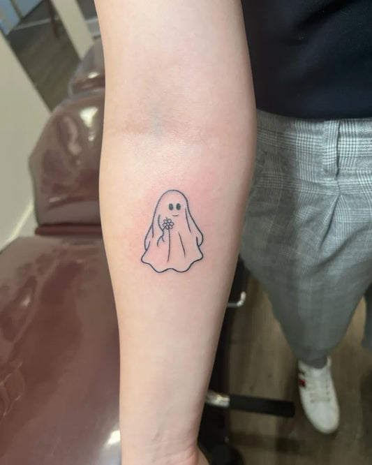 Small Fine Line Ghost with Daisy Tattoo on Women Arm by @samiellefoltz