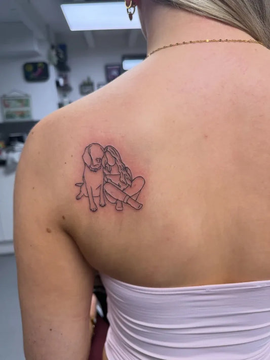 Small Fine Line Girl and Dog Tattoo on Women Shoulder by @stacey_aitken_tattoos