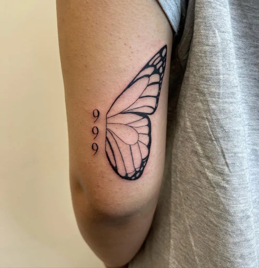 Small Fine Line Half Butterfly and 999 Tattoo on Women Arm by @_clementeink