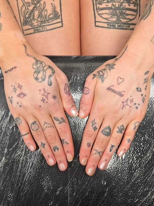 Small Fine Line Hands on Women Tattoo by @emmak.tattoo