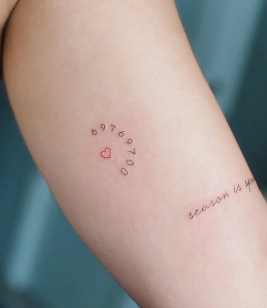 Small Fine Line Heart Numbers Season Text on Women Arm Tattoo by @vera.gamze
