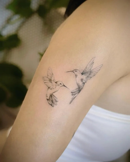 Small Fine Line Hummingbirds Tattoo on Women Arm by @baronart_helen