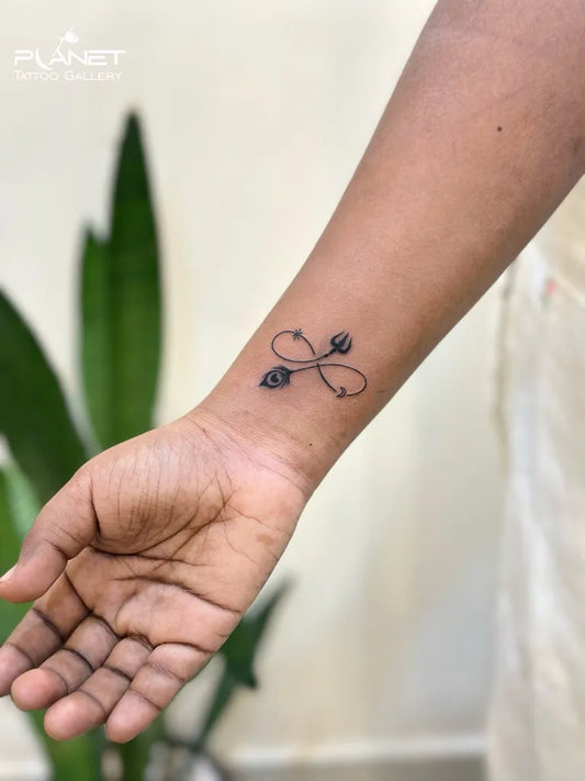 Small Fine Line Infinity Symbol Tattoo on Women Wrist by @gaurav_patil77