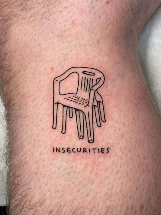 Small Fine Line Insecurities Folding Chair on Men Arm Tattoo by @nancydestroyer