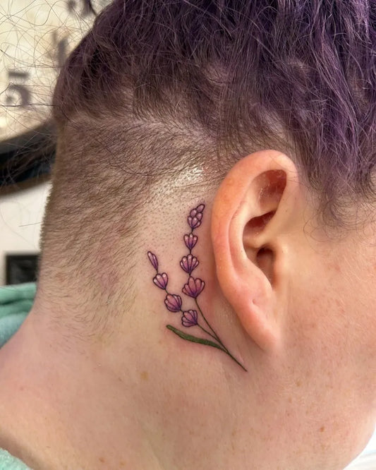 Small Fine Line Lavender Tattoo on Women Behind the Ear by @siobhangallagher_art