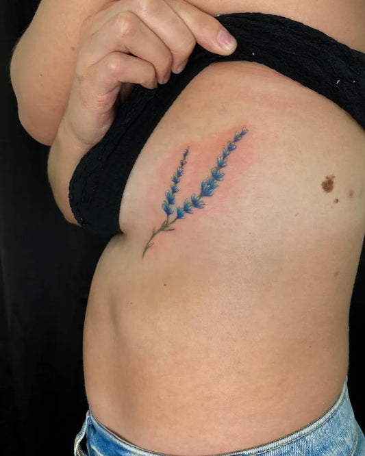 Small Fine Line Lavender Tattoo on Women Rib by @mortismarauder