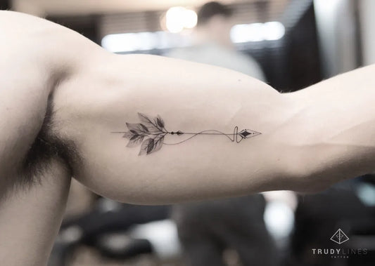 Small Fine Line Leaf Arrow Tattoo on Men Arm by @trudy_lines_tattoo