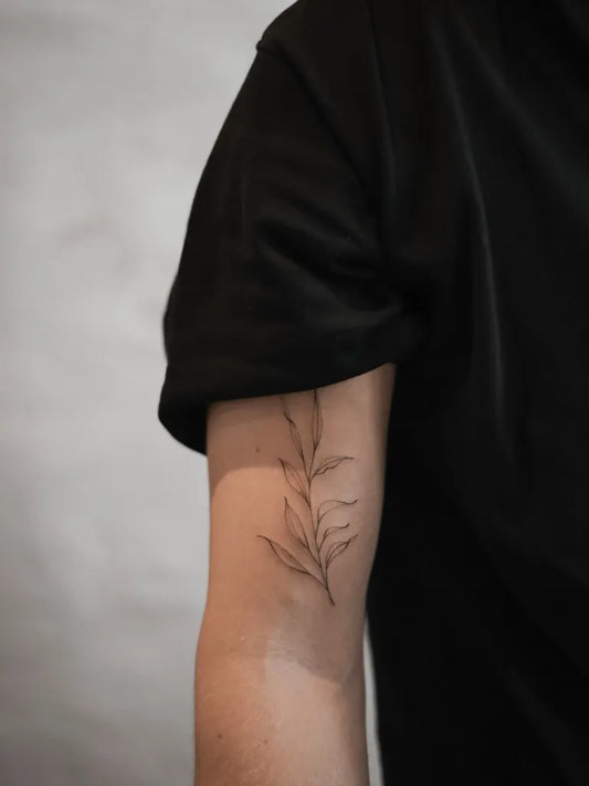 Small Fine Line Leaf Nature Tattoo on Men Arm by @danielles_wayofliving