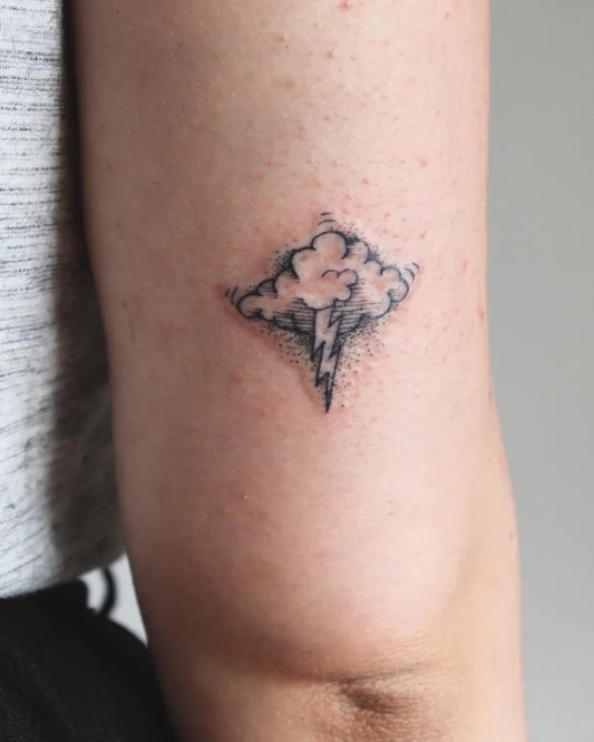 Small Fine Line Lightning Bolt Cloud Tattoo on Women Arm by @rachel__finelli
