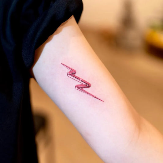 Small Fine Line Lightning Bolt Tattoo on Women Arm by @zero_ink_