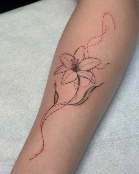 Small Fine Line Lily Flower with Stem and Leaves on Women Arm Tattoo by @natitattoo