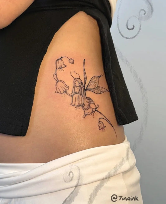 Small Fine Line Lily of the Valley Fairy Women Hip Tattoo by @7inaink