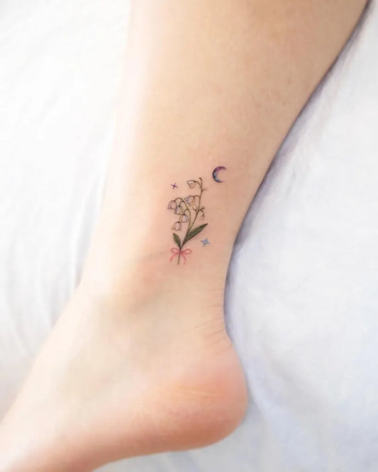 Small Fine Line Lily of the Valley Moon and Stars on Women Ankle Tattoo by @ciel_tattoo