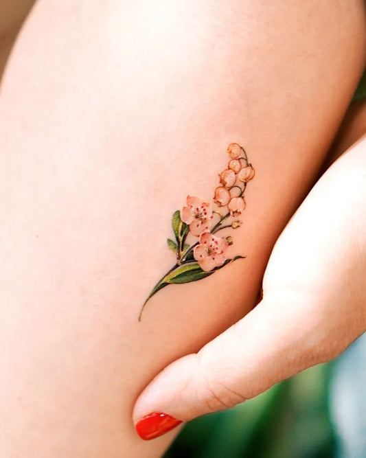 Small Fine Line Lily of the Valley Women Arm Tattoo by @abii_tattoo