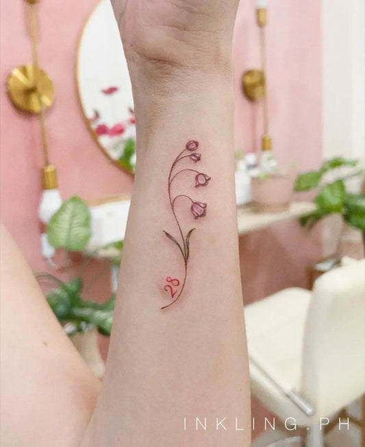 Small Fine Line Lily of the Valley Women Wrist Tattoo by @inkling.ph