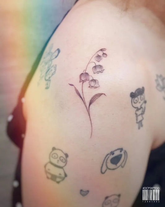 Small Fine Line Lily of the Valley and Cute Animals on Women Arm Tattoo by @dcptattoo