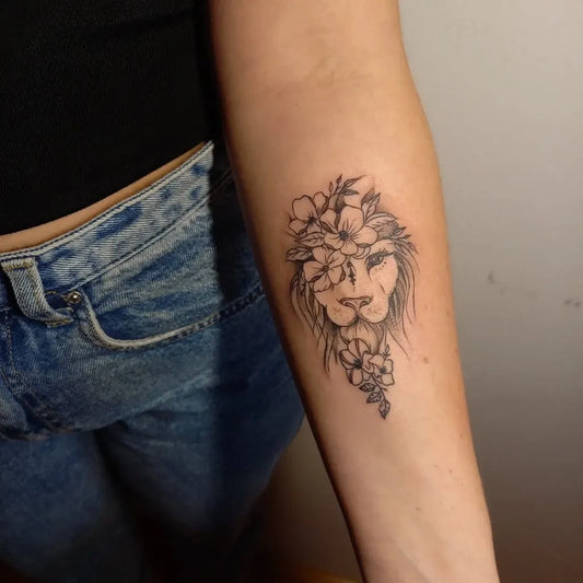 Small Fine Line Lion with Flowers on Women Arm Tattoo by @pank_artattoo