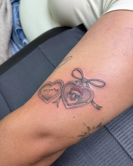 Small Fine Line Locket with Skulls on Women Arm Tattoo by @honeyz.ink