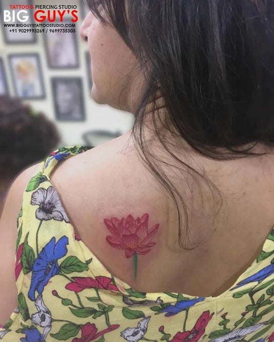 Small Fine Line Lotus Flower on Women Back Tattoo by @bigguystattoo