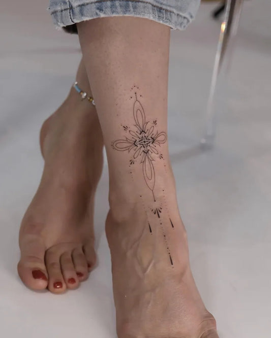 Small Fine Line Mandala Tattoo on Women Ankle by @monochrom.ink