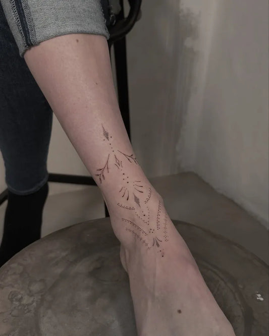 Small Fine Line Mandala Vines Tattoo on Women Foot by @dennis.vierdrei