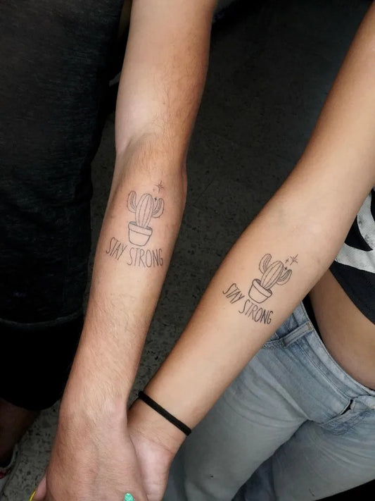 Small Fine Line Matching Cactus Stay Strong Tattoo on Women Arm by @handicapp_