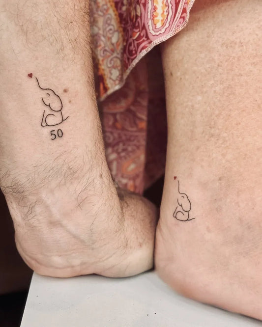 Small Fine Line Matching Elephant Tattoo on Women Ankle by @bnanatattoo