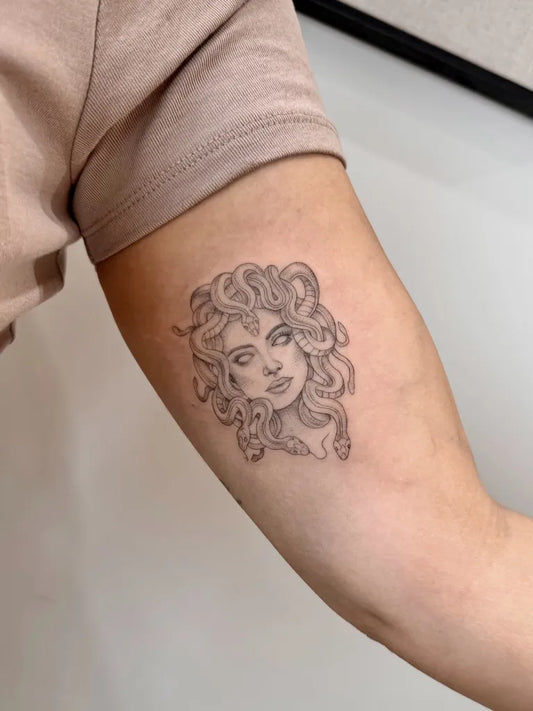 Small Fine Line Medusa on Women Arm Tattoo by @alexia.opuntia.tattoo