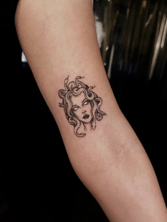 Small Fine Line Medusa on Women Arm Tattoo by @dopa_tattoos