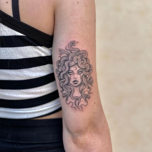 Small Fine Line Medusa on Women Arm Tattoo by @tattoo_therapy_studio