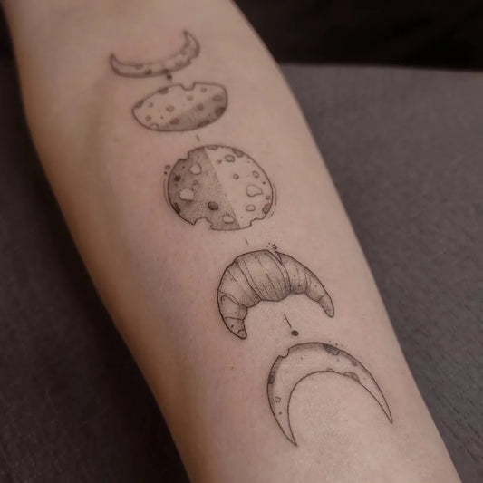 Small Fine Line Moon Phases and Croissant Tattoo on Women Forearm by @linda.tattooing