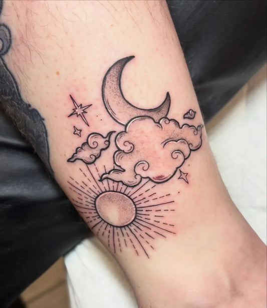 Small Fine Line Moon Sun Cloud Tattoo on Women Arm by @queenofclouds__