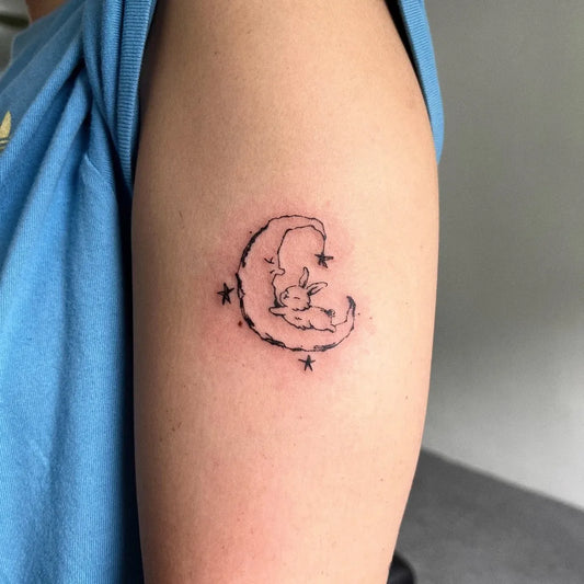 Small Fine Line Moon and Bunny Tattoo on Women Arm by @nothin.tooit
