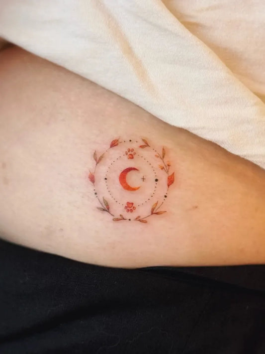 Small Fine Line Moon and Floral Tattoo on Women Wrist by @carolinastattoo