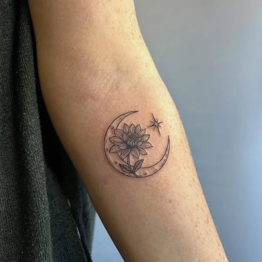Small Fine Line Moon and Flower Tattoo on Women Arm by @milakurek.tattoos